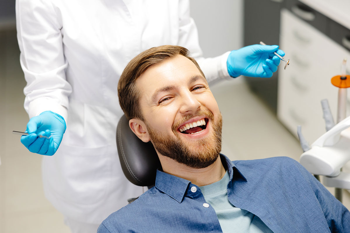 A happy patient at Knutson Family Dentistry in Vermillion, SD
